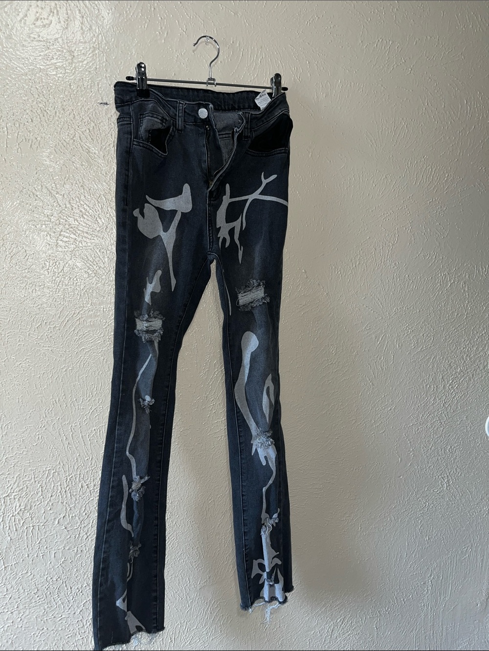 Women's Black Distressed Slim Jeans with Abstract Paint Detail